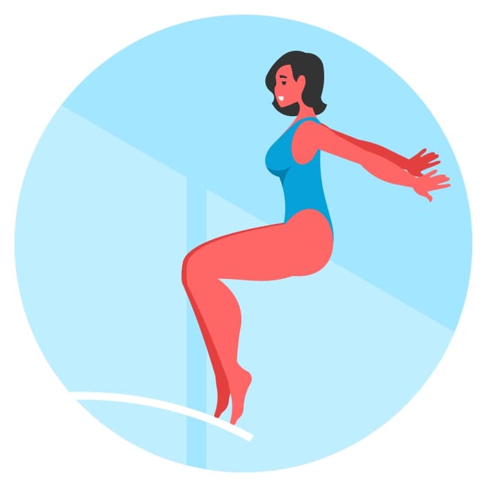 Woman jumping off a diving board