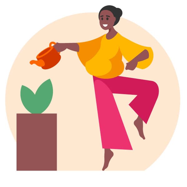 Woman watering a plant