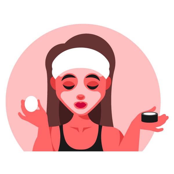 Donna che applica la maschera per il trucco