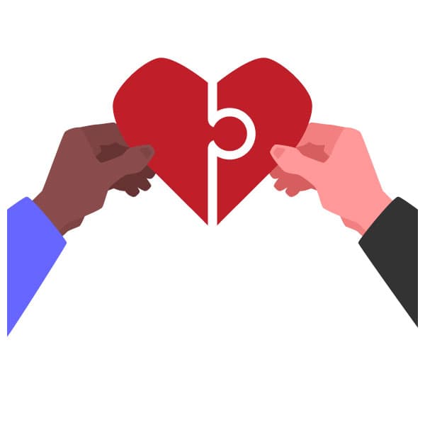 Hands piece together a heart